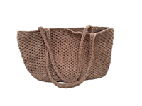 a brown crocheted tote bag on a black background