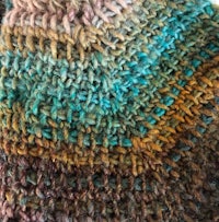 a close up of a knitted hat