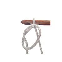 a wooden stick with a rope attached to it