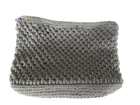 a grey crocheted pouch on a black background