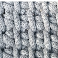 a close up of a grey knitted stitch